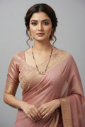 A contemporary mangalsutra featuring a unique dual-strand chain of black beads and gold links. The pendant consists of two interlocking rectangular frames—one gold-toned and one set with clear crystals—housing a central emerald-cut clear stone, displayed on a black jewelry bust.