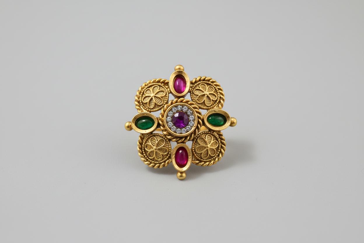 Decorative brooch with gemstones on a purple textured fabric background